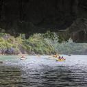 Kayaking under natural arch