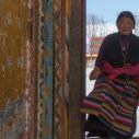 Litang - Tibetan prayer exiting White Stuppa Park