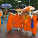Monks under the rain